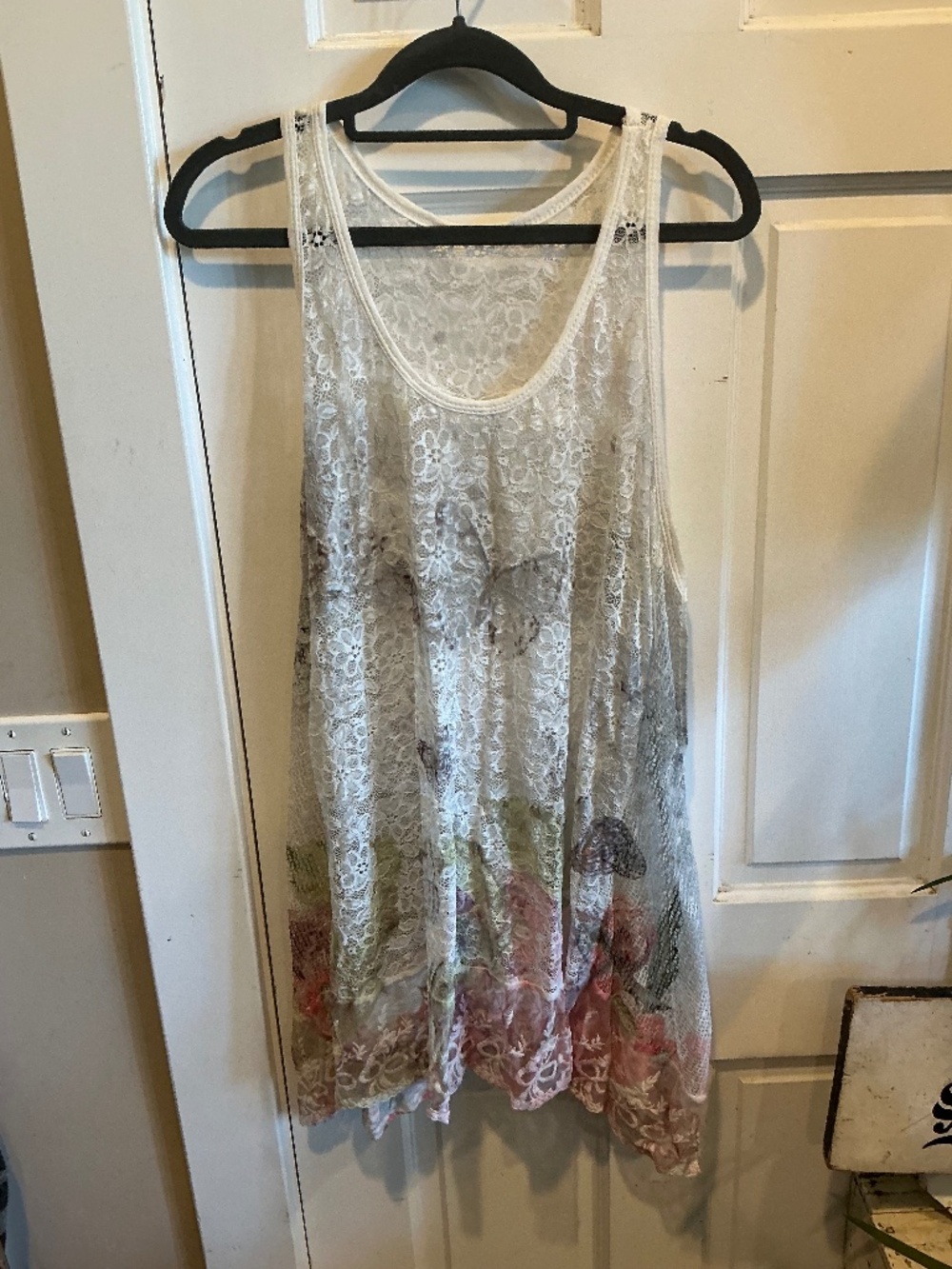 Beautiful tank top with flare and lace! One size fits most